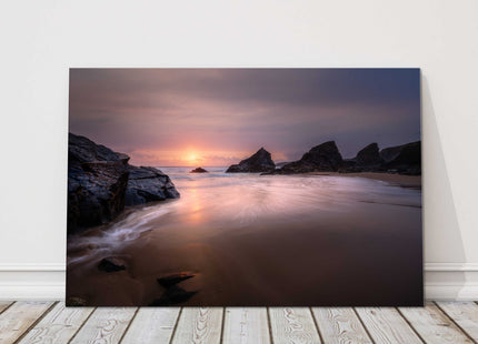 Bedruthan Steps at sunset, North Cornwall. Silhouetted Sea stacks. Canvas Print.