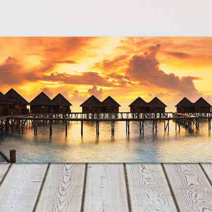 Tropical sunset canvas picture print. Sunset over water villas. Canvas picture.