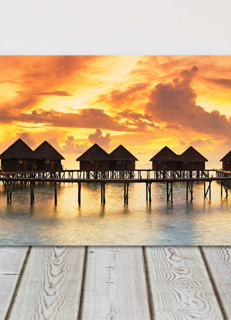Tropical sunset canvas picture print. Sunset over water villas. Canvas picture.