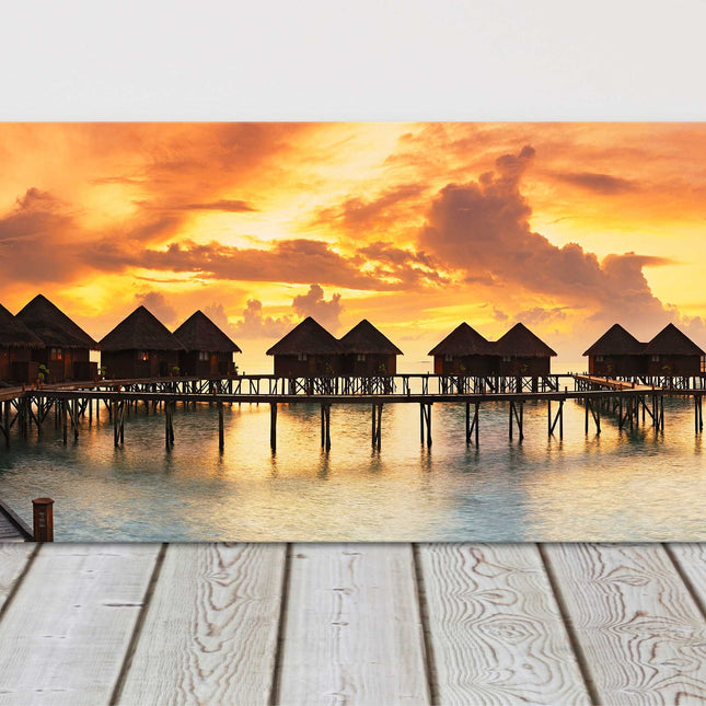 Tropical sunset canvas picture print. Sunset over water villas. Canvas picture.