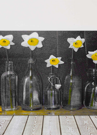 Daffodils in bottles art canvas picture print