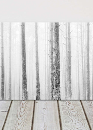 Pine trees in winter fog. Panoramic canvas picture print. Black and white.