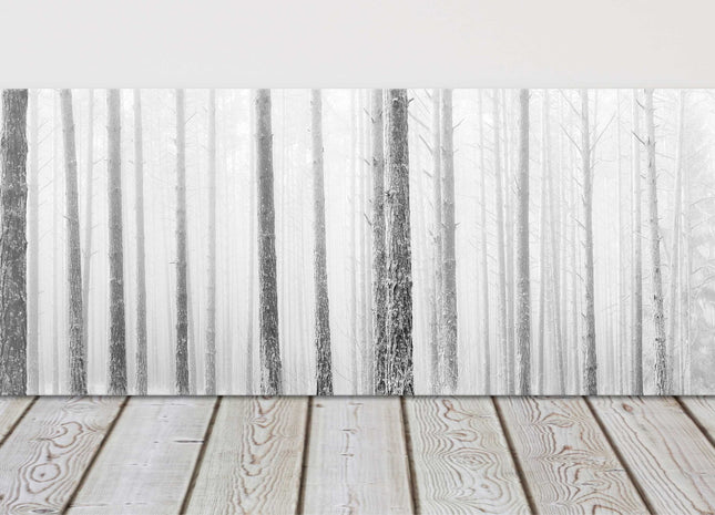 Pine trees in winter fog. Panoramic canvas picture print. Black and white.