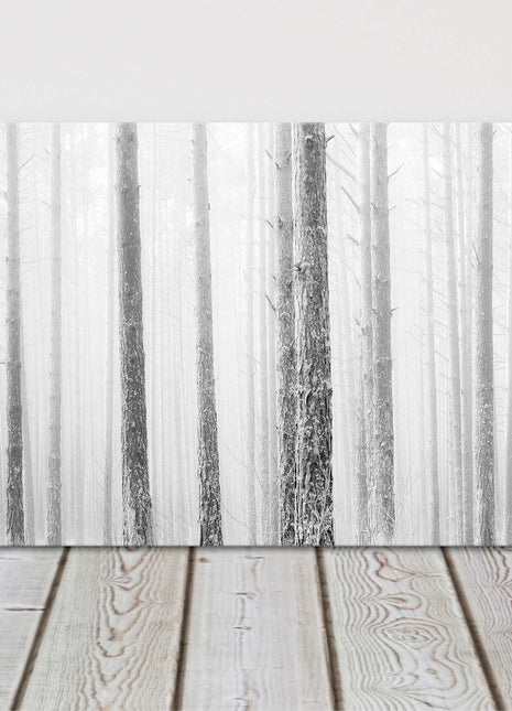 Pine trees in winter fog. Panoramic canvas picture print. Black and white.
