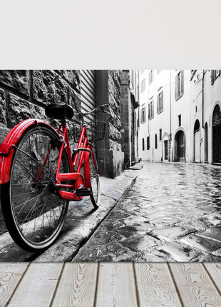 Cobbled street black and white with red bicycle canvas picture print