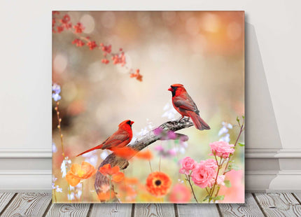 Birds and flowers. Colourful birds perched on a branch. Canvas picture print.