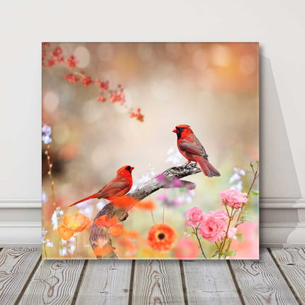 Birds and flowers. Colourful birds perched on a branch. Canvas picture print.