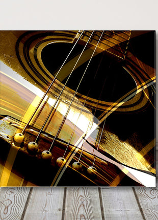 Acoustic Guitar close up in gold and black canvas picture print
