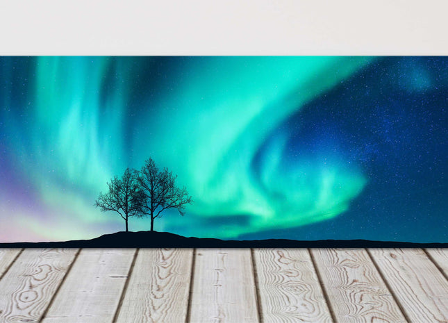 Northern lights over the trees. Panoramic canvas picture print.