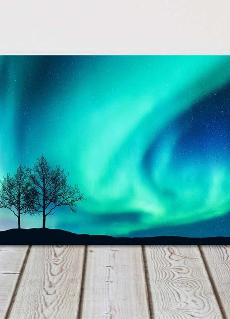 Northern lights over the trees. Panoramic canvas picture print.