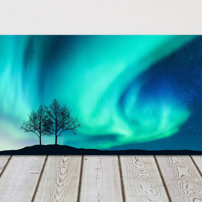 Northern lights over the trees. Panoramic canvas picture print.