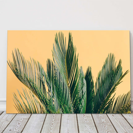 Tropical palm tree on a yellow background. Canvas picture print. Modern art
