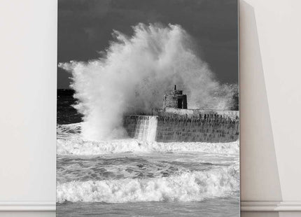 Waves over the Harbour wall. Portreath beach, Cornwall. Canvas picture print