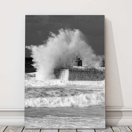 Waves over the Harbour wall. Portreath beach, Cornwall. Canvas picture print