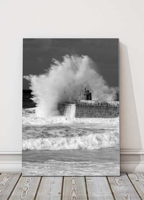 Waves over the Harbour wall. Portreath beach, Cornwall. Canvas picture print