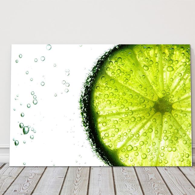 Lime slice in water bubbles. Canvas picture print.