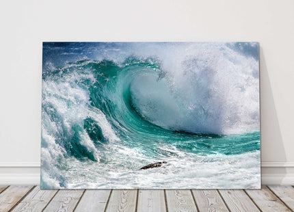 Breaking waves. In the surf. Printed as a canvas picture print.