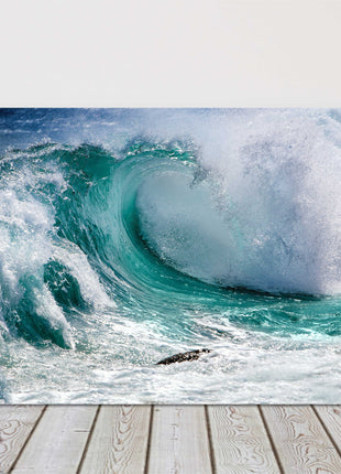 Breaking waves. In the surf. Printed as a canvas picture print.