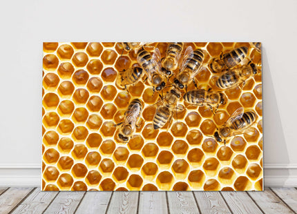 Bees swarming on honeycomb. Printed canvas picture print.