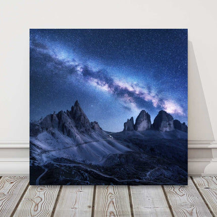 Milky Way over the mountains, Dolomites, Italy. Printed canvas picture print.