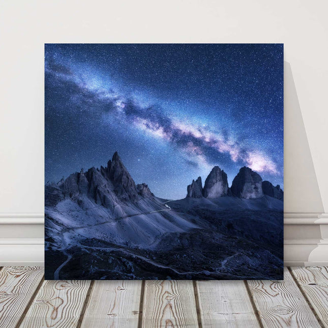 Milky Way over the mountains, Dolomites, Italy. Printed canvas picture print.