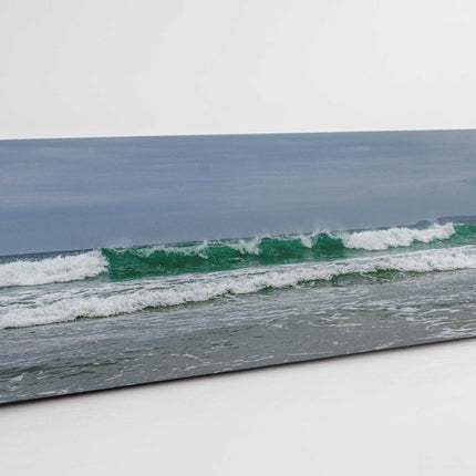 Breaking waves on the Cornish coast. Panoramic Canvas picture print.