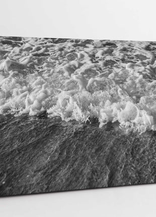 Waves rolling on Cornish beach. Printed in black and white canvas picture print