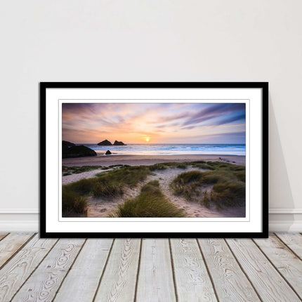 Holywell bay at sunset. Framed picture print with a choice of frame colours.