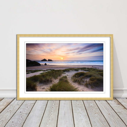 Holywell bay at sunset. Framed picture print with a choice of frame colours.