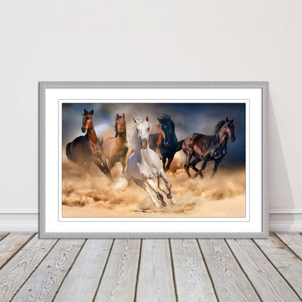 Wild horses galloping through sand. Framed picture choice on frames
