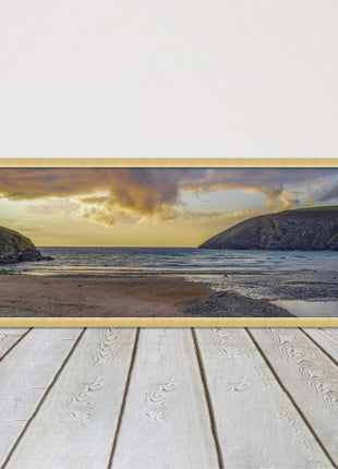 Mawgan Porth at sunset. Panoramic framed picture print. A choice of frames.