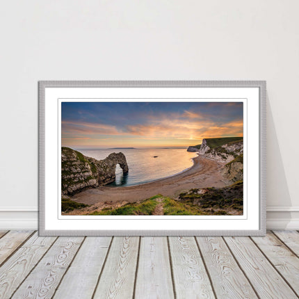 Durdle door at sunset, Dorset. Framed picture with a choice of frame colours.