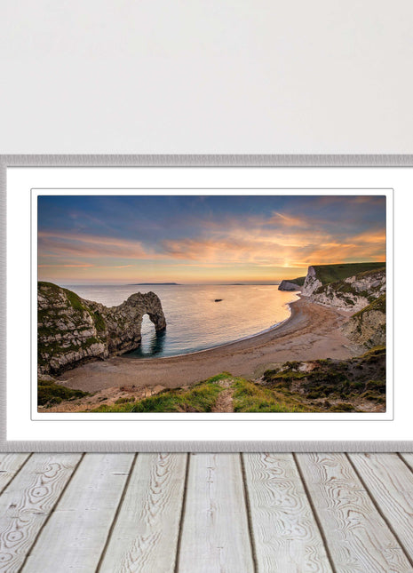 Durdle door at sunset, Dorset. Framed picture with a choice of frame colours.