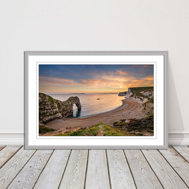 Durdle door at sunset, Dorset. Framed picture with a choice of frame colours.
