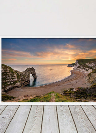 Durdle door at sunset, Dorset. Framed picture with a choice of frame colours.