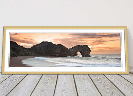 Durdle door on Jurassic coast dorset at sunset. Panoramic framed picture print