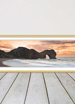 Durdle door on Jurassic coast dorset at sunset. Panoramic framed picture print