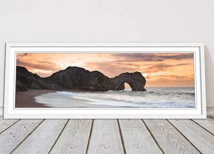 Durdle door on Jurassic coast dorset at sunset. Panoramic framed picture print