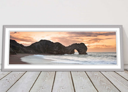 Durdle door on Jurassic coast dorset at sunset. Panoramic framed picture print