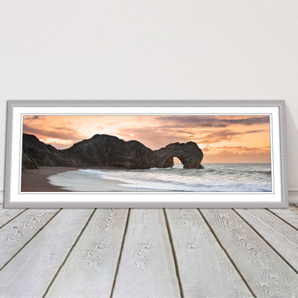 Durdle door on Jurassic coast dorset at sunset. Panoramic framed picture print