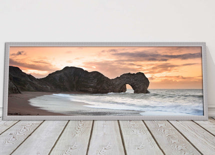 Durdle door on Jurassic coast dorset at sunset. Panoramic framed picture print