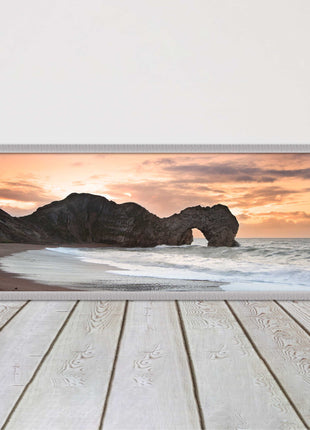 Durdle door on Jurassic coast dorset at sunset. Panoramic framed picture print