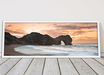 Durdle door on Jurassic coast dorset at sunset. Panoramic framed picture print