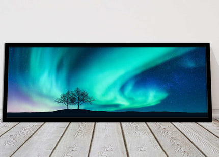 Aurora Borealis, with silhouette of trees. Panoramic framed picture print choice