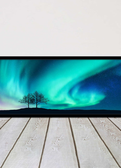 Aurora Borealis, with silhouette of trees. Panoramic framed picture print choice
