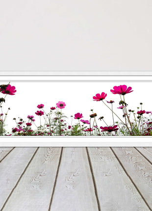 Pink wild flowers on a white background. Panoramic framed picture print