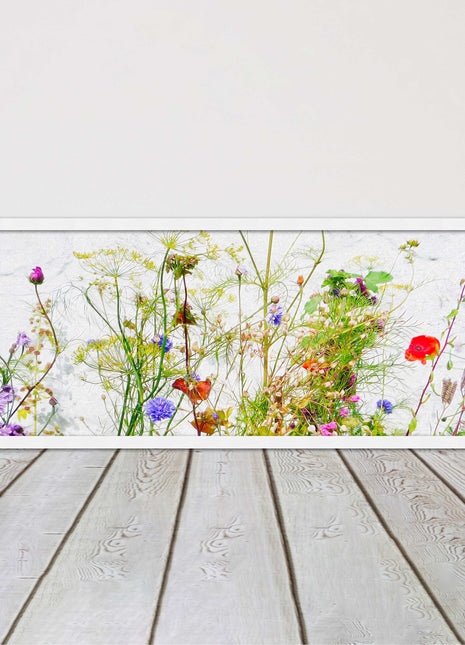 Multi coloured Wild flowers on a white background Panoramic framed picture print