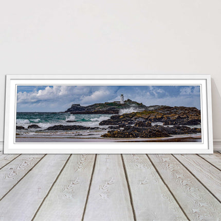 Godrevy Lighthouse with breaking waves at the shore. Cornwall. Framed picture