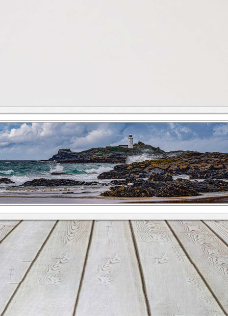 Godrevy Lighthouse with breaking waves at the shore. Cornwall. Framed picture