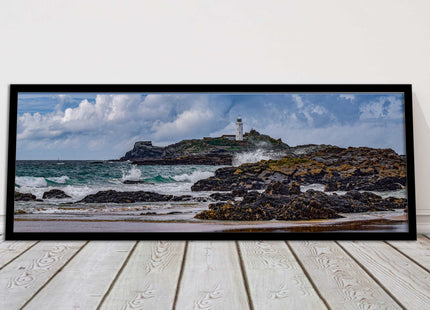 Godrevy Lighthouse with breaking waves at the shore. Cornwall. Framed picture